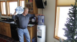 Cole Monka / Wisconsin Center for Investigative Journalism Frank Michna buys bottled water for drinking and cooking in his Caledonia home because of high levels of molybdenum and boron in his well.